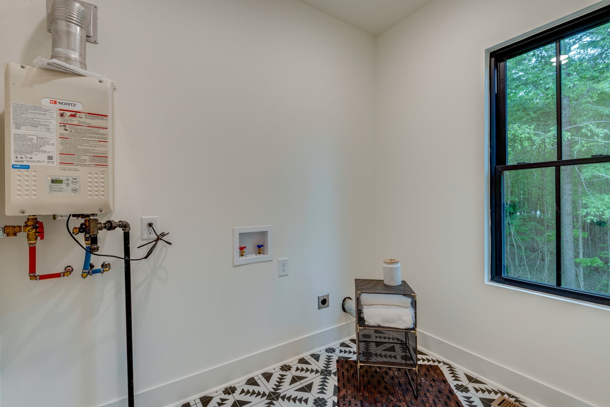 1106 Garton Road Burns, TN 37029 - Photo 35 of 46 a bedroom with a bed and a window