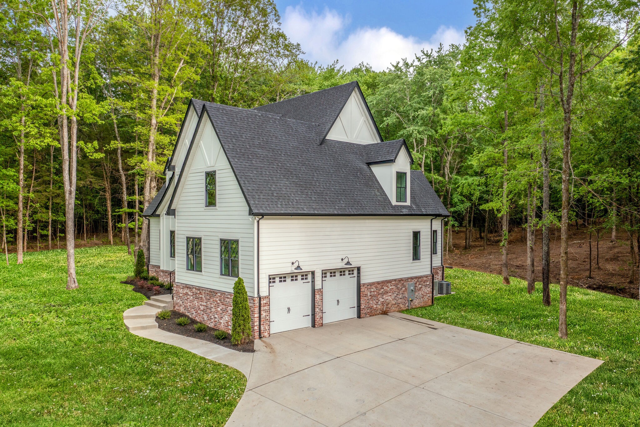 1106 Garton Road Burns, TN 37029 - Photo 41 of 46 a view of a house with yard and sitting area