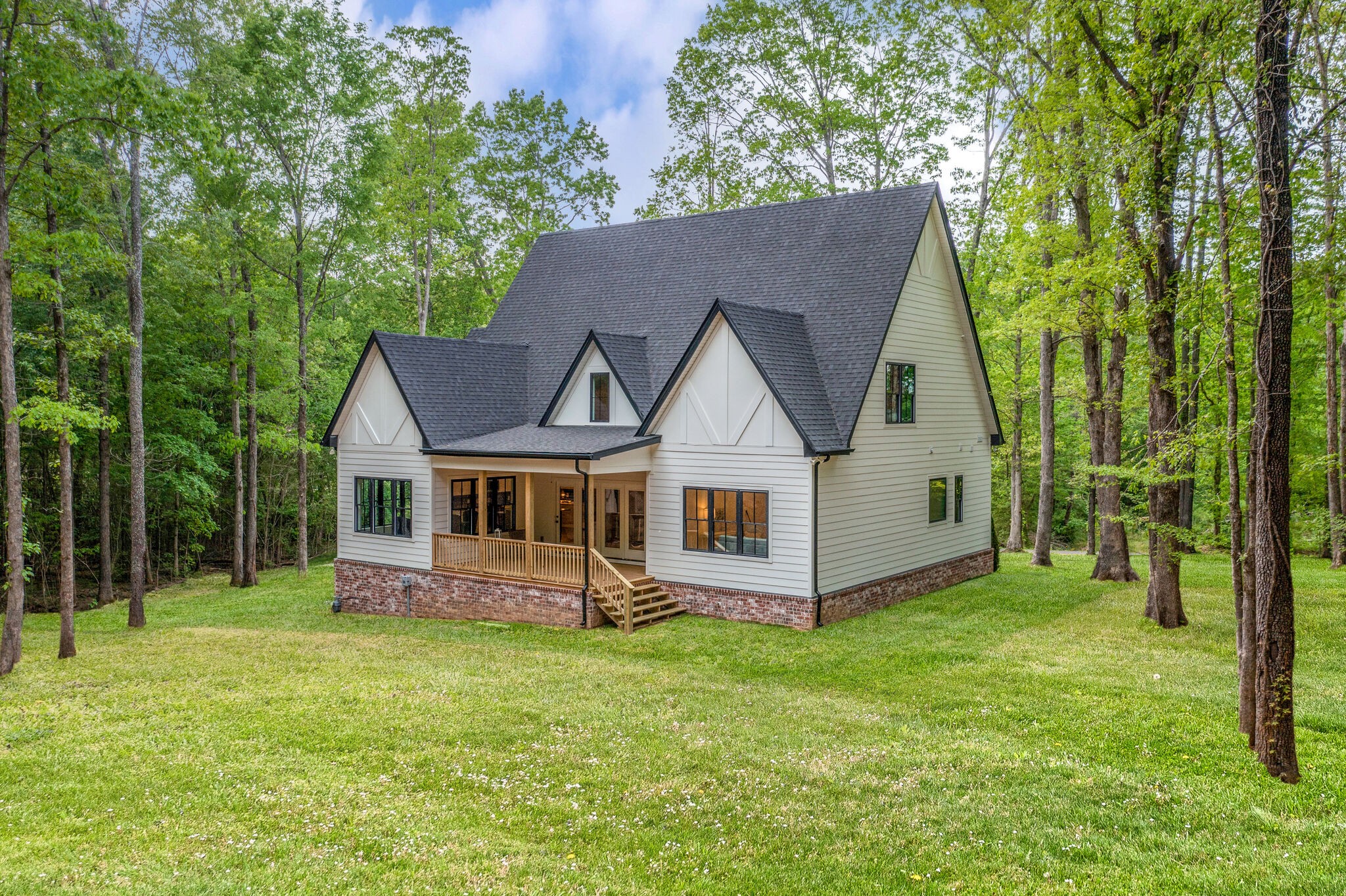 1106 Garton Road Burns, TN 37029 - Photo 45 of 46 front view of a house with a yard