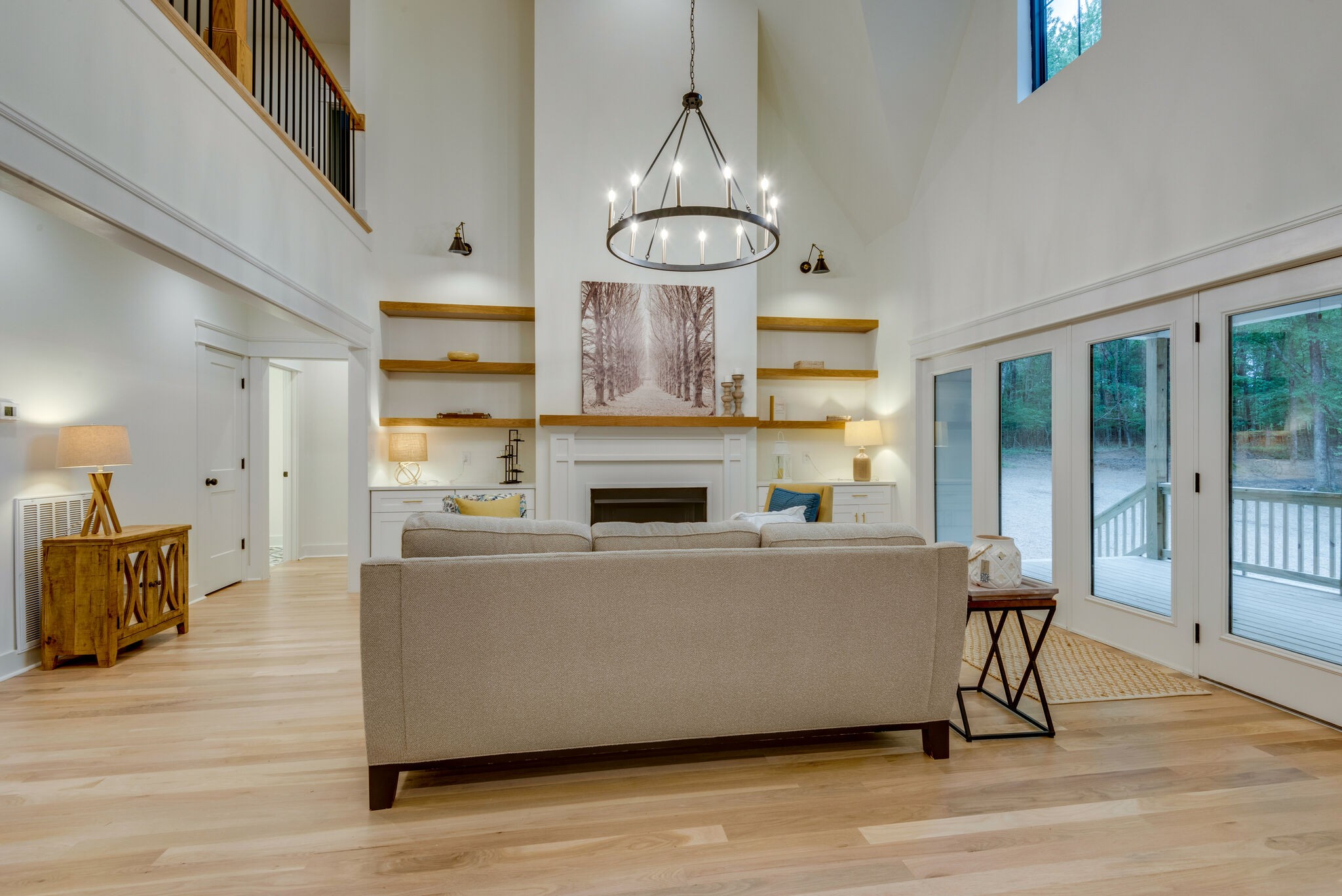 1106 Garton Road Burns, TN 37029 - Photo 6 of 46 a living room with furniture and a chandelier