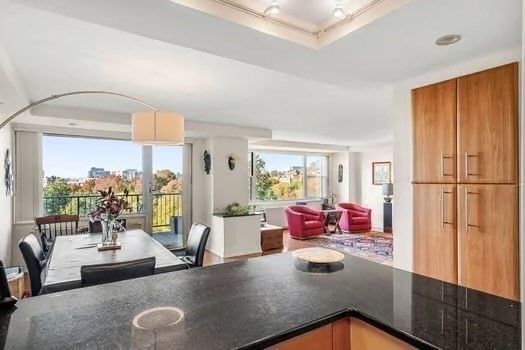 a bed room with a bed and a chair