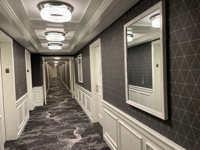 a kitchen with a stove and a refrigerator