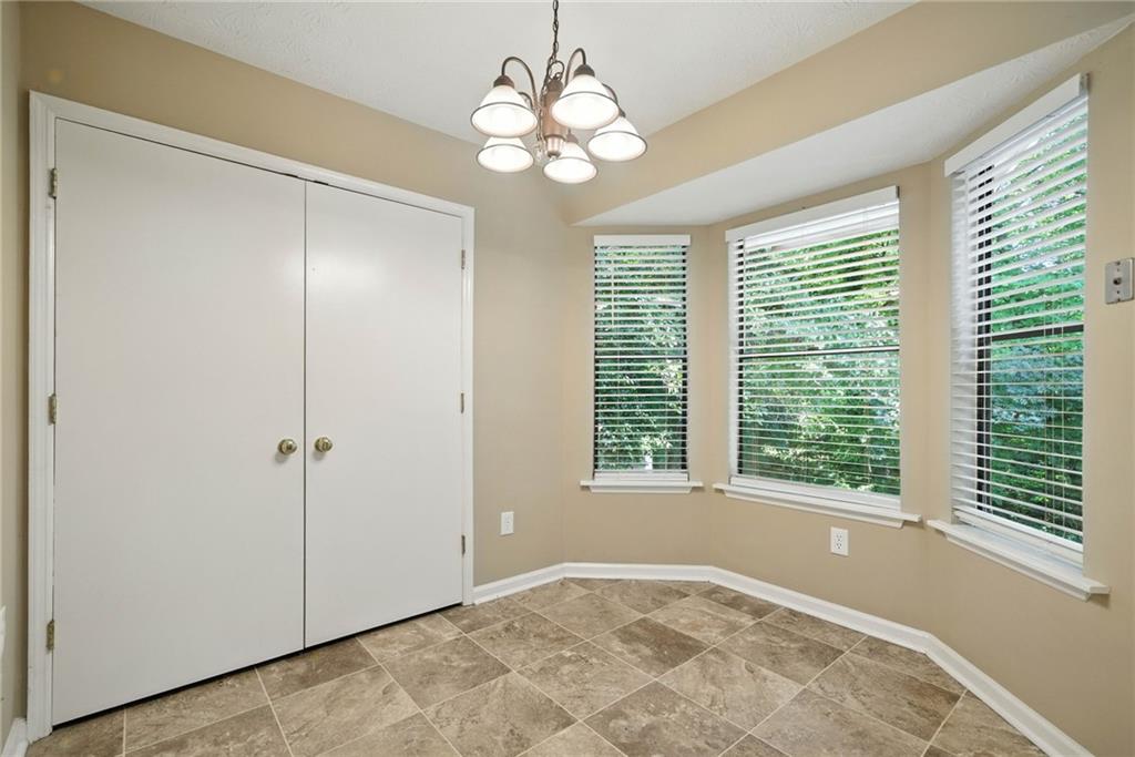 3045 Wildflower Lane Southwest Snellville, GA 30039 - Photo 14 of 35 a view of an empty room with a window