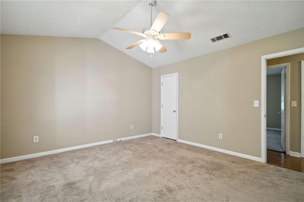 3045 Wildflower Lane Southwest Snellville, GA 30039 - Photo 15 of 35 a view of an empty room with a window