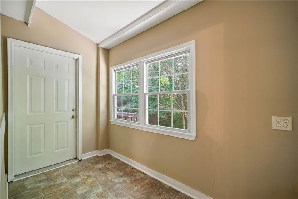 3045 Wildflower Lane Southwest Snellville, GA 30039 - Photo 21 of 35 an empty room with a window