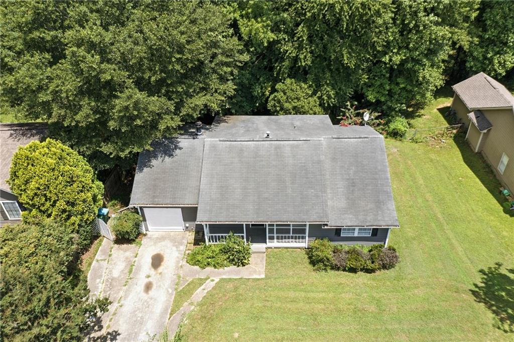 3045 Wildflower Lane Southwest Snellville, GA 30039 - Photo 34 of 35 an aerial view of a house with yard swimming pool and outdoor seating
