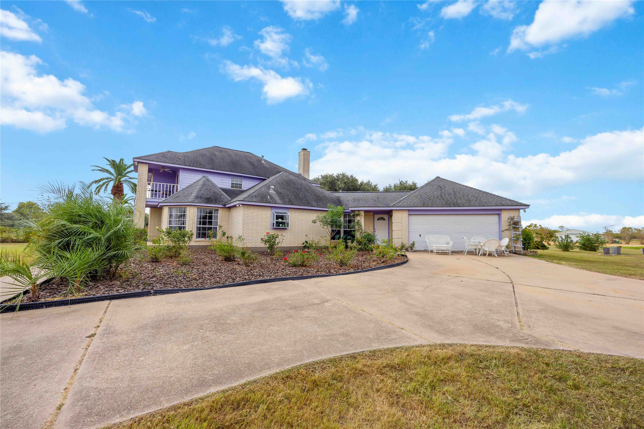 12075 Farm To Market 359 Hempstead, TX 77445 - Photo 12 of 46 a front view of a house with a yard and garage