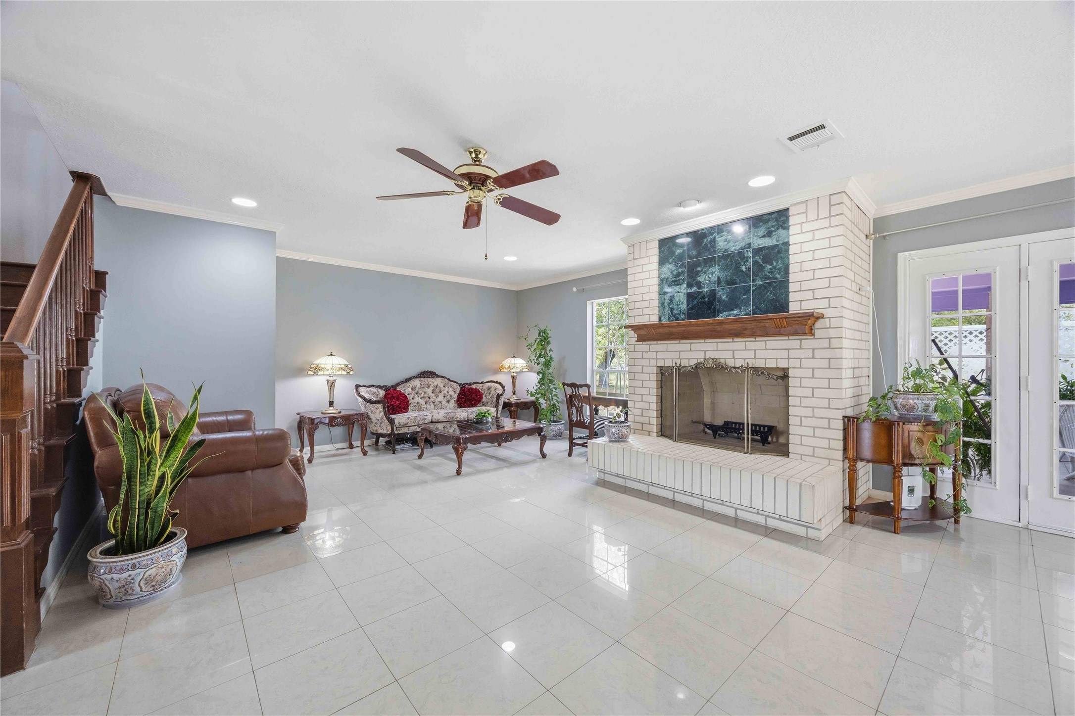 12075 Farm To Market 359 Hempstead, TX 77445 - Photo 20 of 46 a living room with furniture and a fireplace