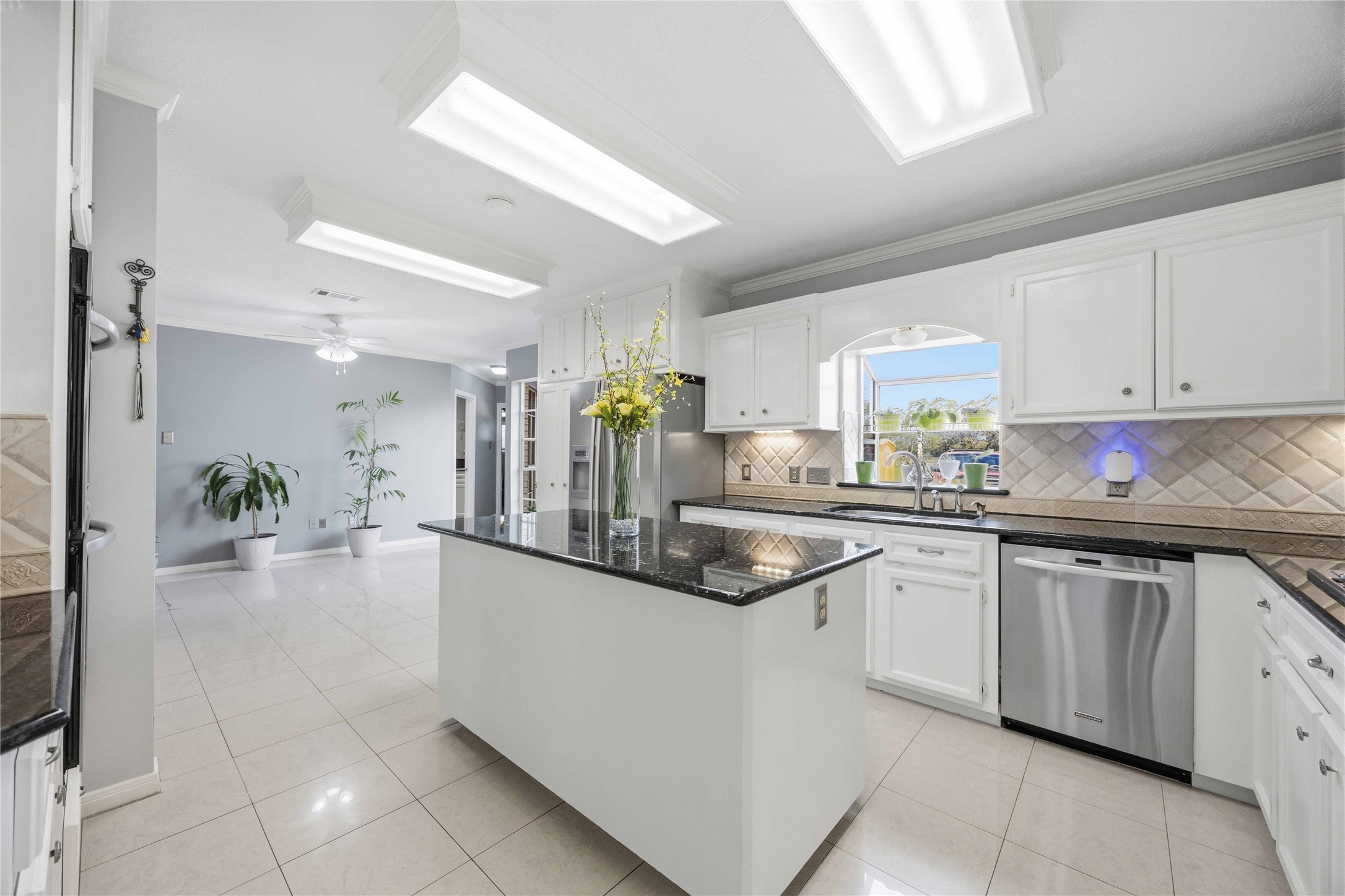 12075 Farm To Market 359 Hempstead, TX 77445 - Photo 2 of 46 a kitchen with stainless steel appliances kitchen island granite countertop a sink and cabinets