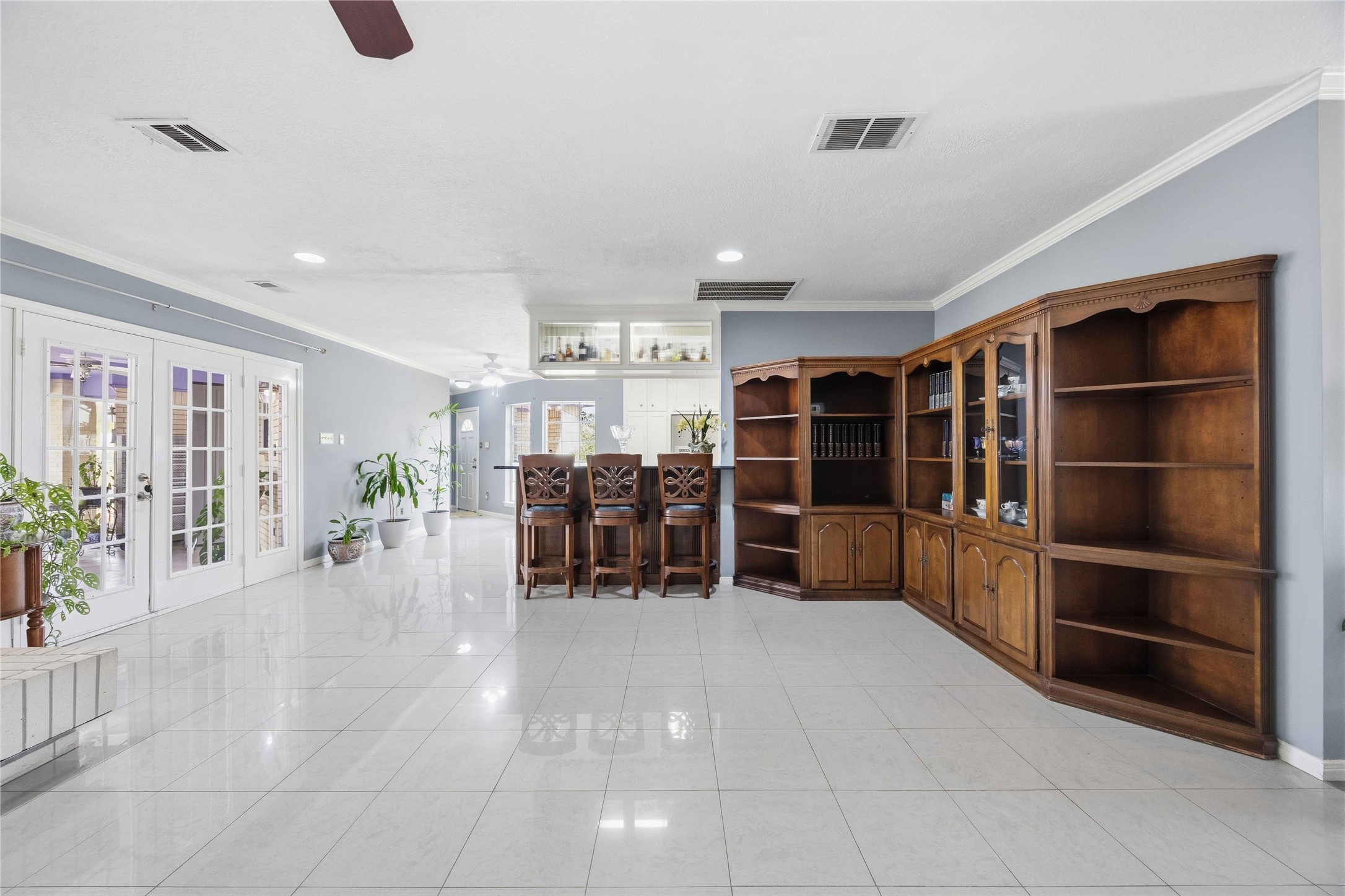 12075 Farm To Market 359 Hempstead, TX 77445 - Photo 21 of 46 a room with lots of furniture and a large window