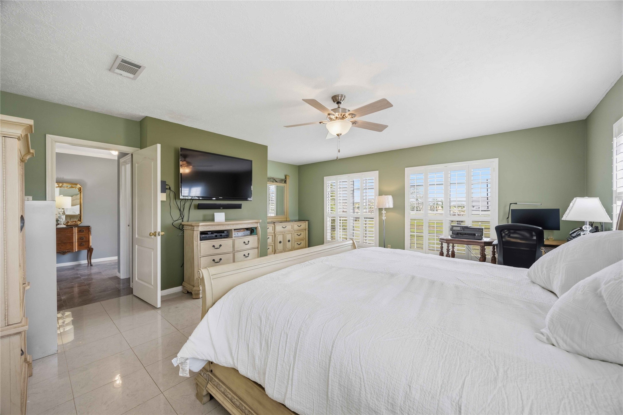 12075 Farm To Market 359 Hempstead, TX 77445 - Photo 28 of 46 a bedroom with a bed and a flat screen tv