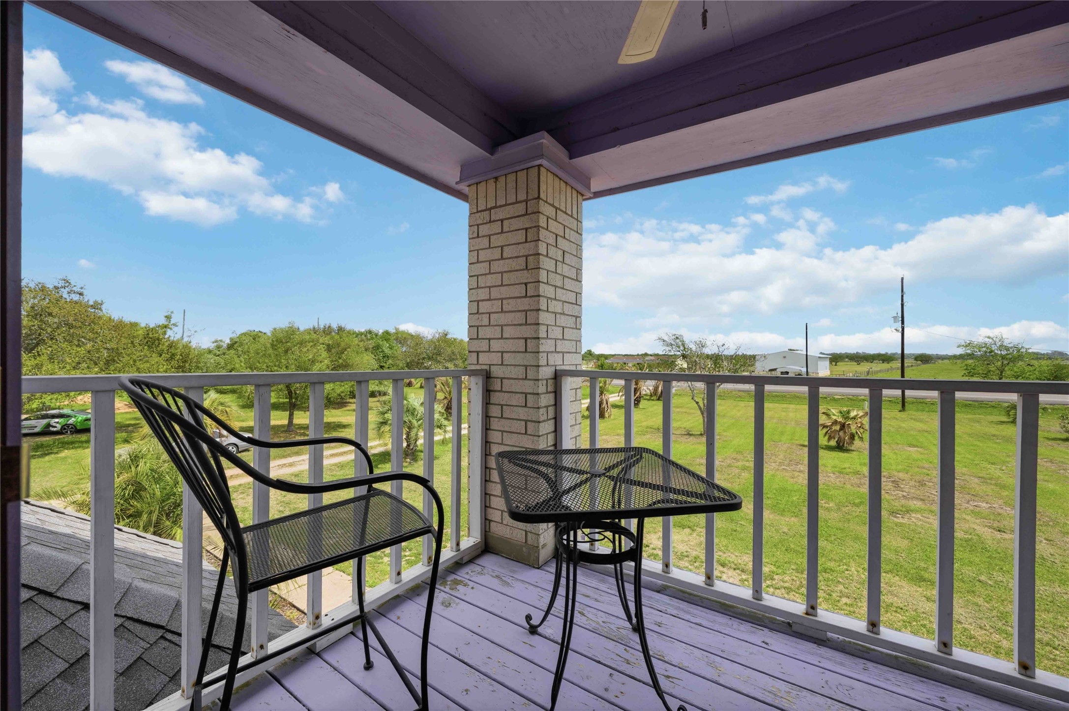 12075 Farm To Market 359 Hempstead, TX 77445 - Photo 4 of 46 a view of a chairs and table in the balcony