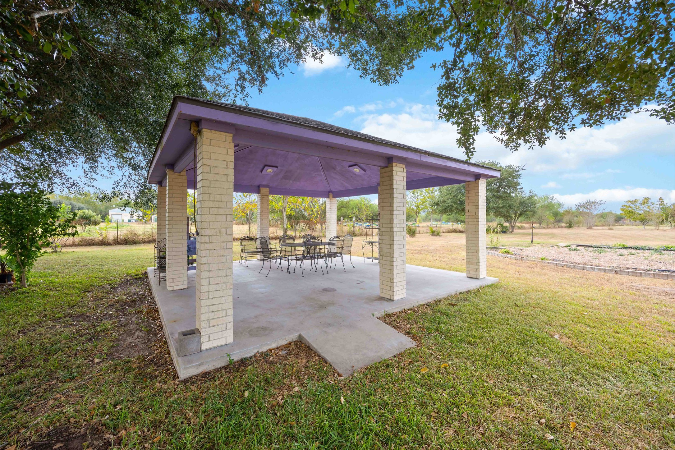 12075 Farm To Market 359 Hempstead, TX 77445 - Photo 42 of 46 a view of a house with backyard and sitting area