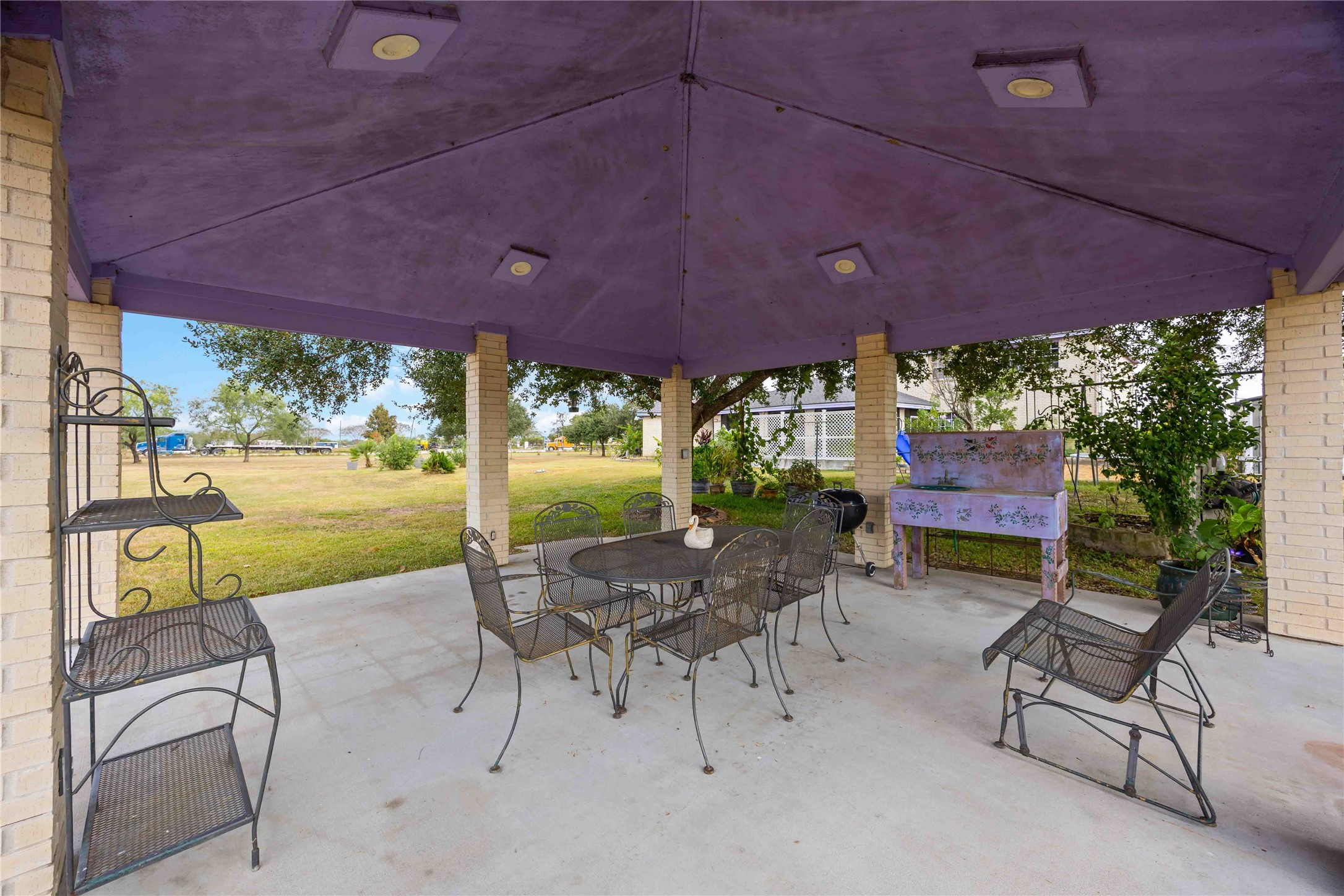12075 Farm To Market 359 Hempstead, TX 77445 - Photo 43 of 46 a patio with glass top table and chairs