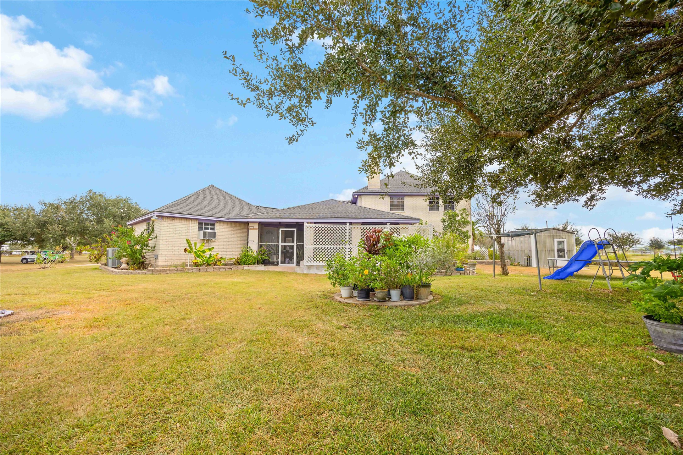 12075 Farm To Market 359 Hempstead, TX 77445 - Photo 45 of 46 a front view of a house with yard and green space
