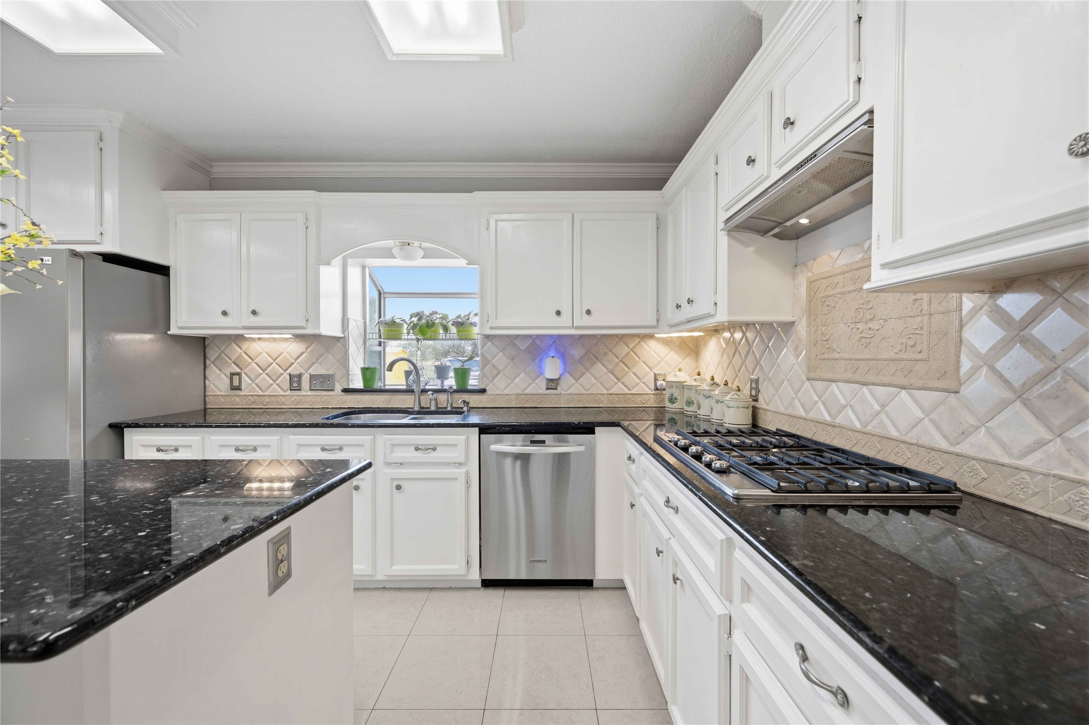 12075 Farm To Market 359 Hempstead, TX 77445 - Photo 5 of 46 a kitchen with stainless steel appliances granite countertop a sink stove cabinets and granite counter top