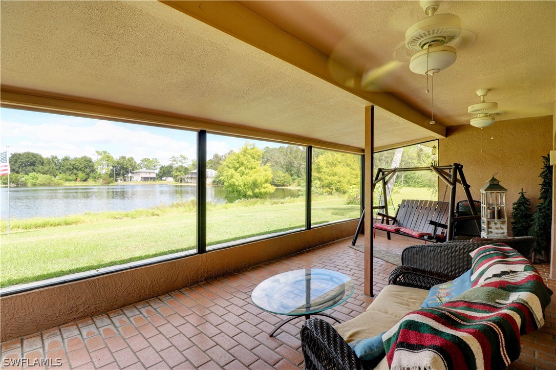 10550 Deal Road North Fort Myers, FL 33917 - Photo 11 of 35 a bedroom with furniture and a large window