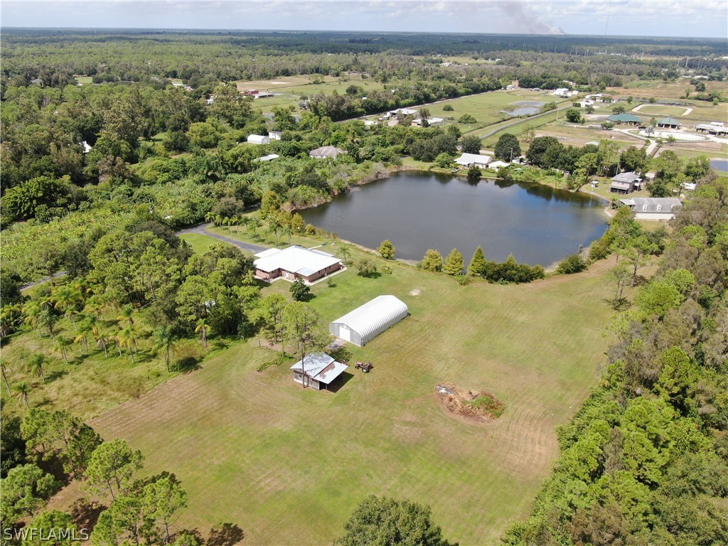10550 Deal Road North Fort Myers, FL 33917 - Photo 6 of 35 an aerial view of residential houses with outdoor space