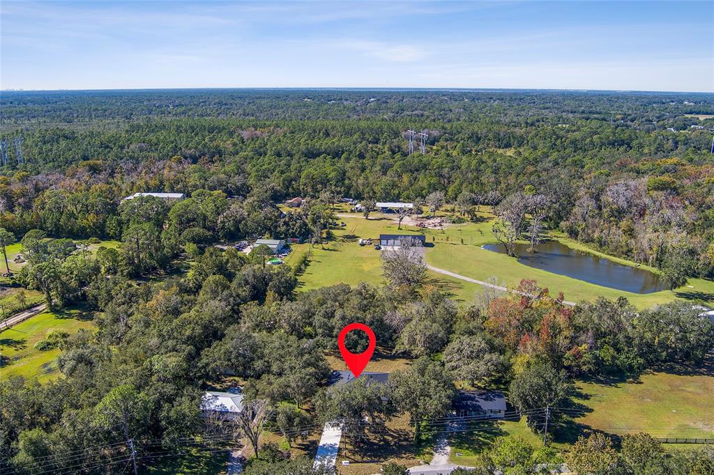 304 North Jungle Road Geneva, FL 32732 - Photo 49 of 49 an aerial view of residential houses with outdoor space and swimming pool