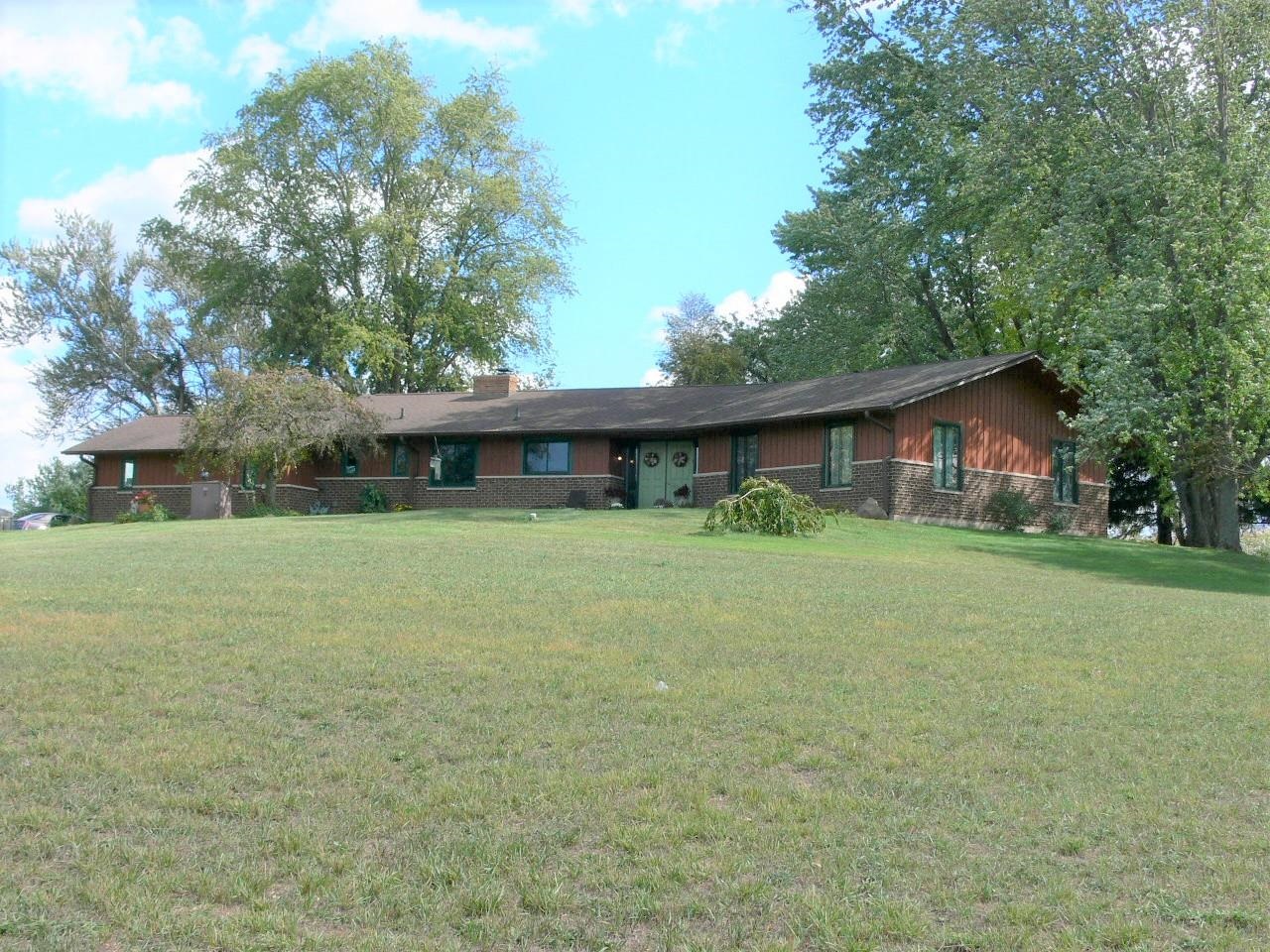 7236 Stephens Road Rockton, IL 61072 - Photo 2 of 15 a front view of house with yard and green space