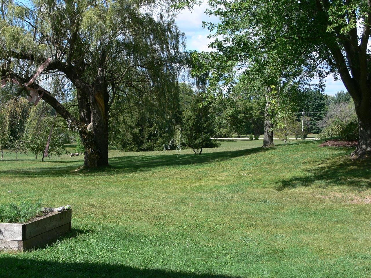 7236 Stephens Road Rockton, IL 61072 - Photo 8 of 15 a backyard of a house with lots of green space