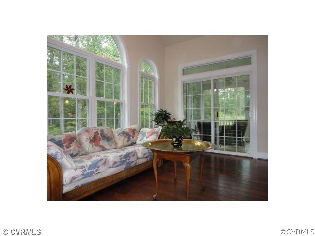 17911 Beach Road Chesterfield, VA 23838 - Photo 11 of 12 a living room with furniture and a large window
