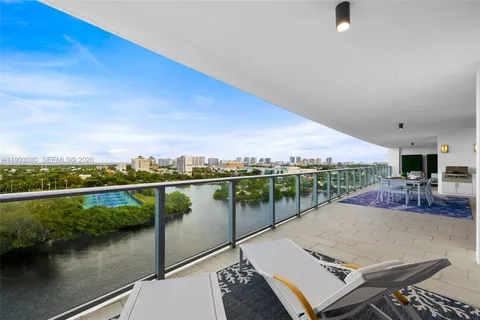 a view of a balcony with lake view