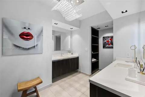 a bath tub sitting next to a shower