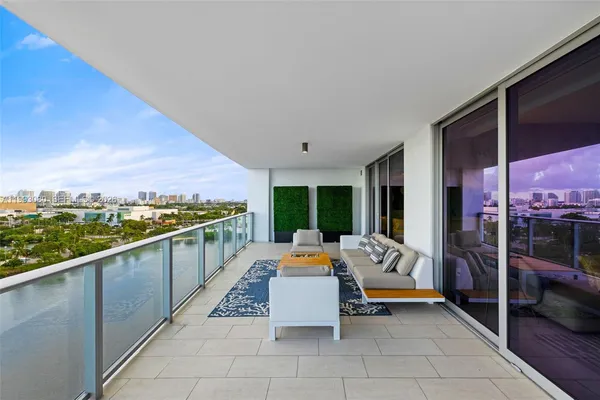 a view of a terrace with couches and a table
