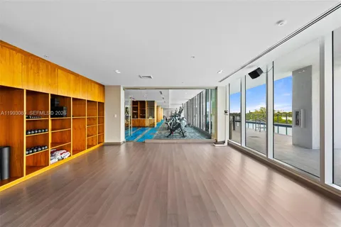 a view of swimming pool with seating area