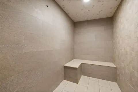 a front view of a building with lake view