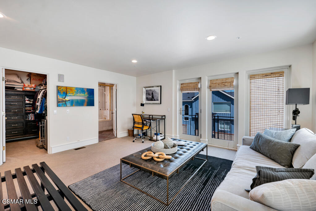 1245 Capri Way Oxnard, CA 93035 - Photo 47 of 94 a living room with furniture and a flat screen tv