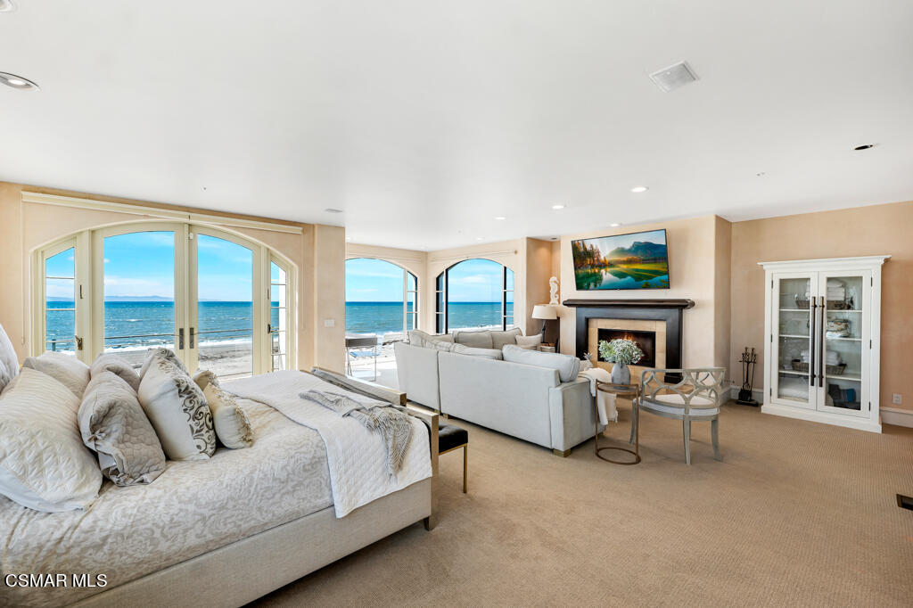 1245 Capri Way Oxnard, CA 93035 - Photo 54 of 94 a living room with furniture and a fireplace