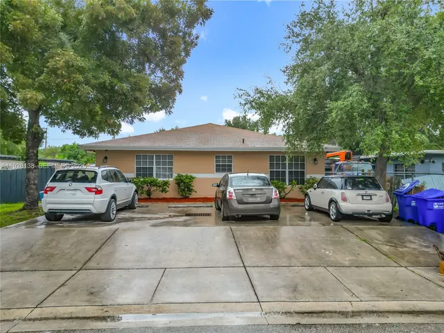 a car parked in front of a house