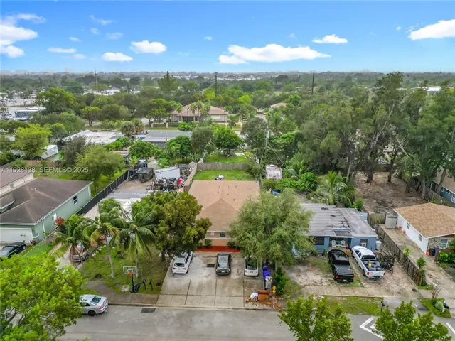 a view of a lake with a yard
