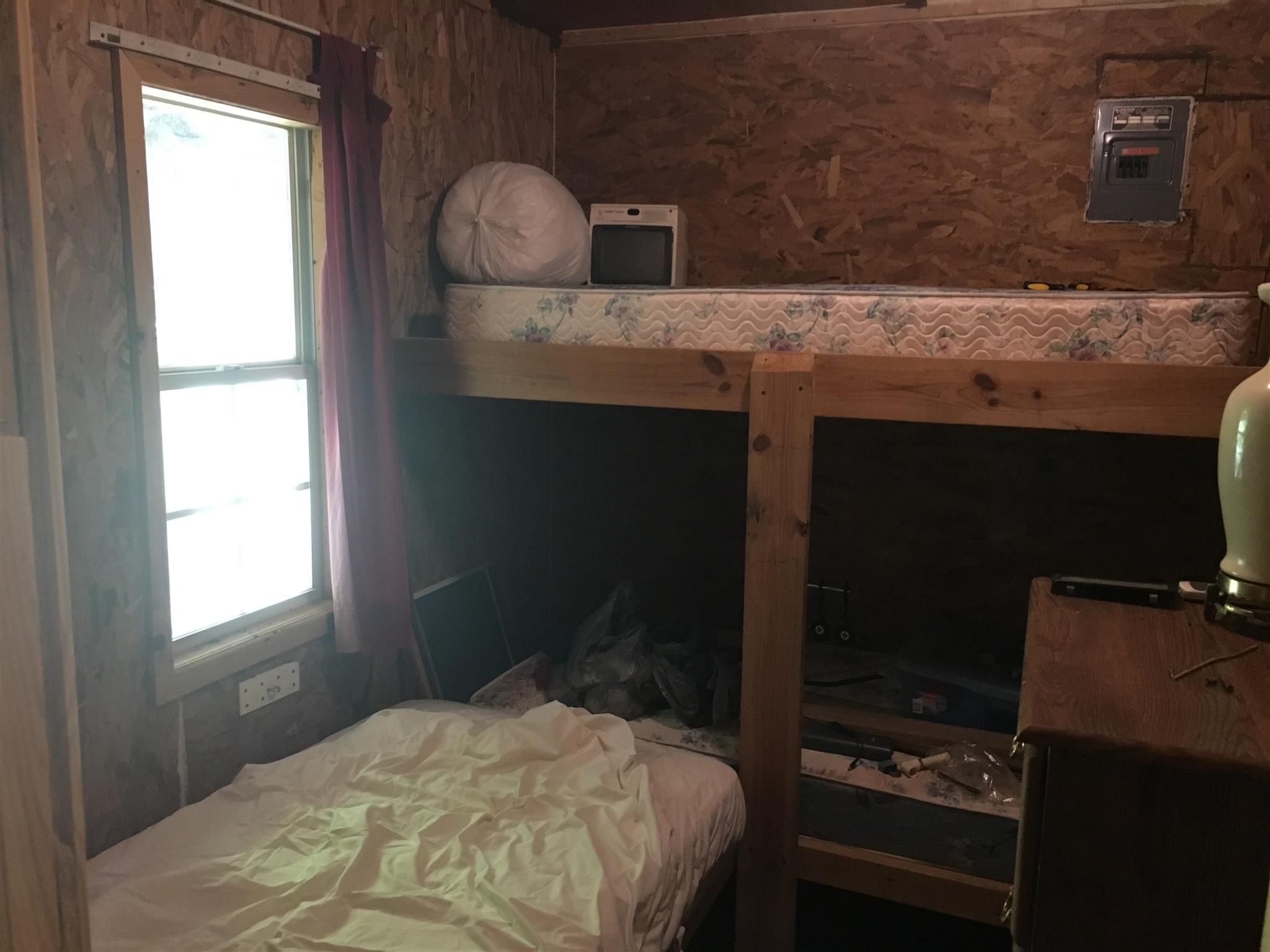 0 North Of Highway Red Boiling Springs, TN 37150 - Photo 15 of 23 a bedroom with a bed and a stove