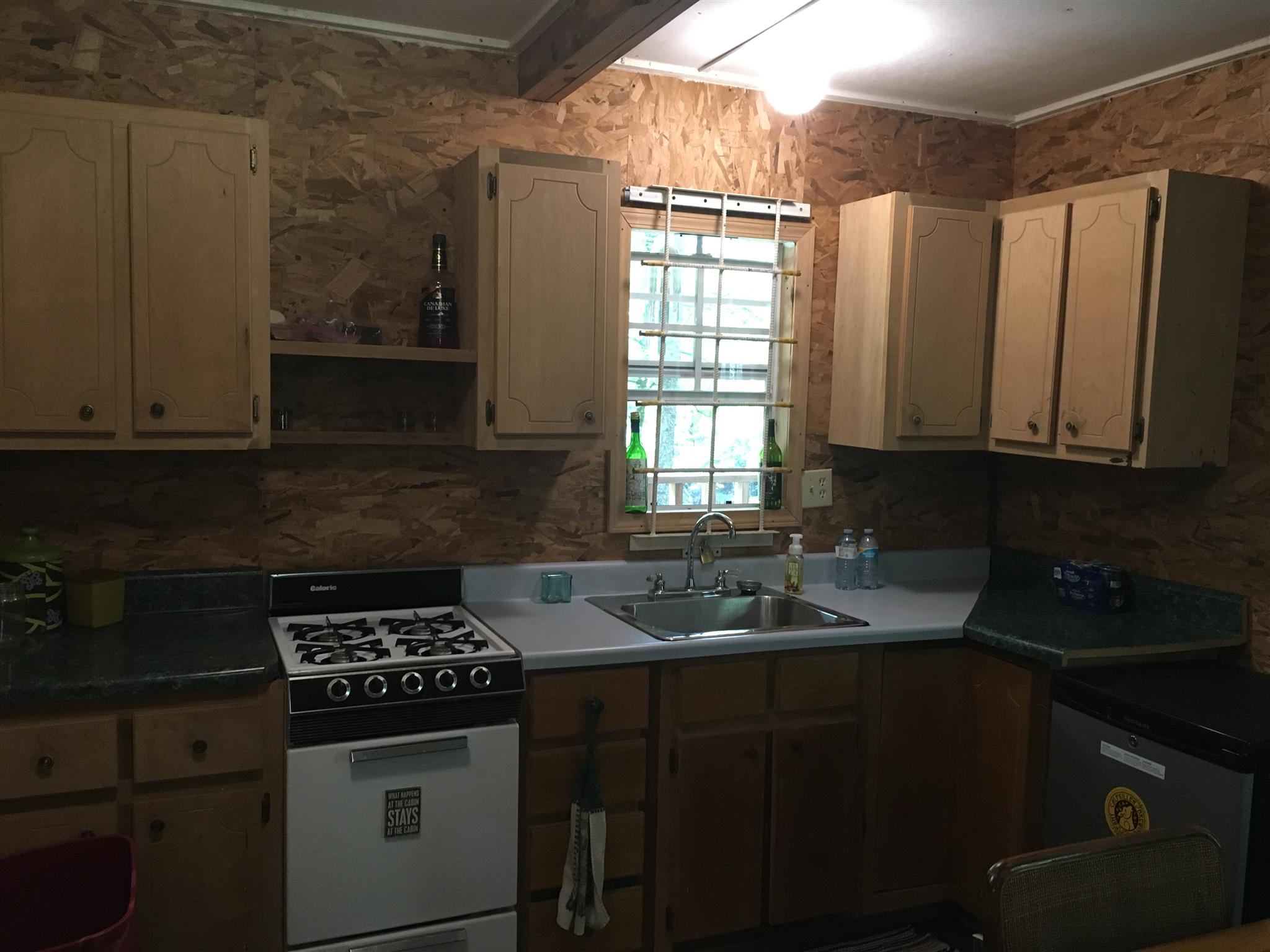 0 North Of Highway Red Boiling Springs, TN 37150 - Photo 19 of 23 a kitchen with granite countertop a sink stove and cabinets