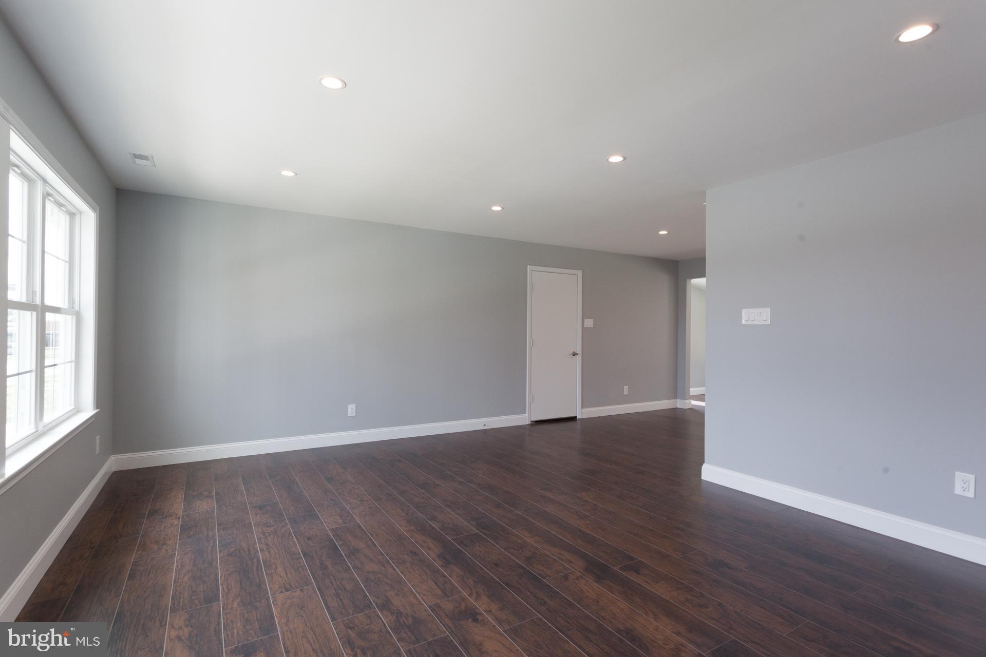 9 Cardinal Road Levittown, PA 19057 - Photo 6 of 29 Living room flows into Dining Area