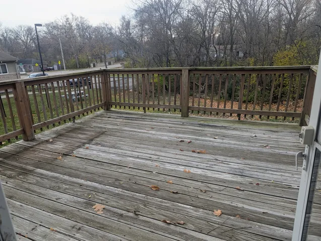 a balcony with trees