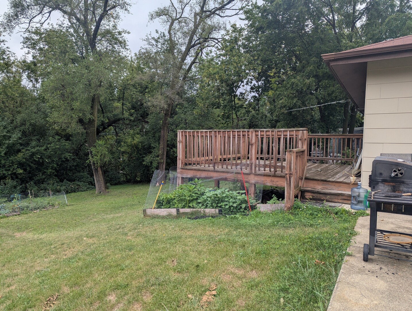 413 West Palatine Road Palatine, IL 60067 - Photo 18 of 19 a view of a chair and table in the backyard