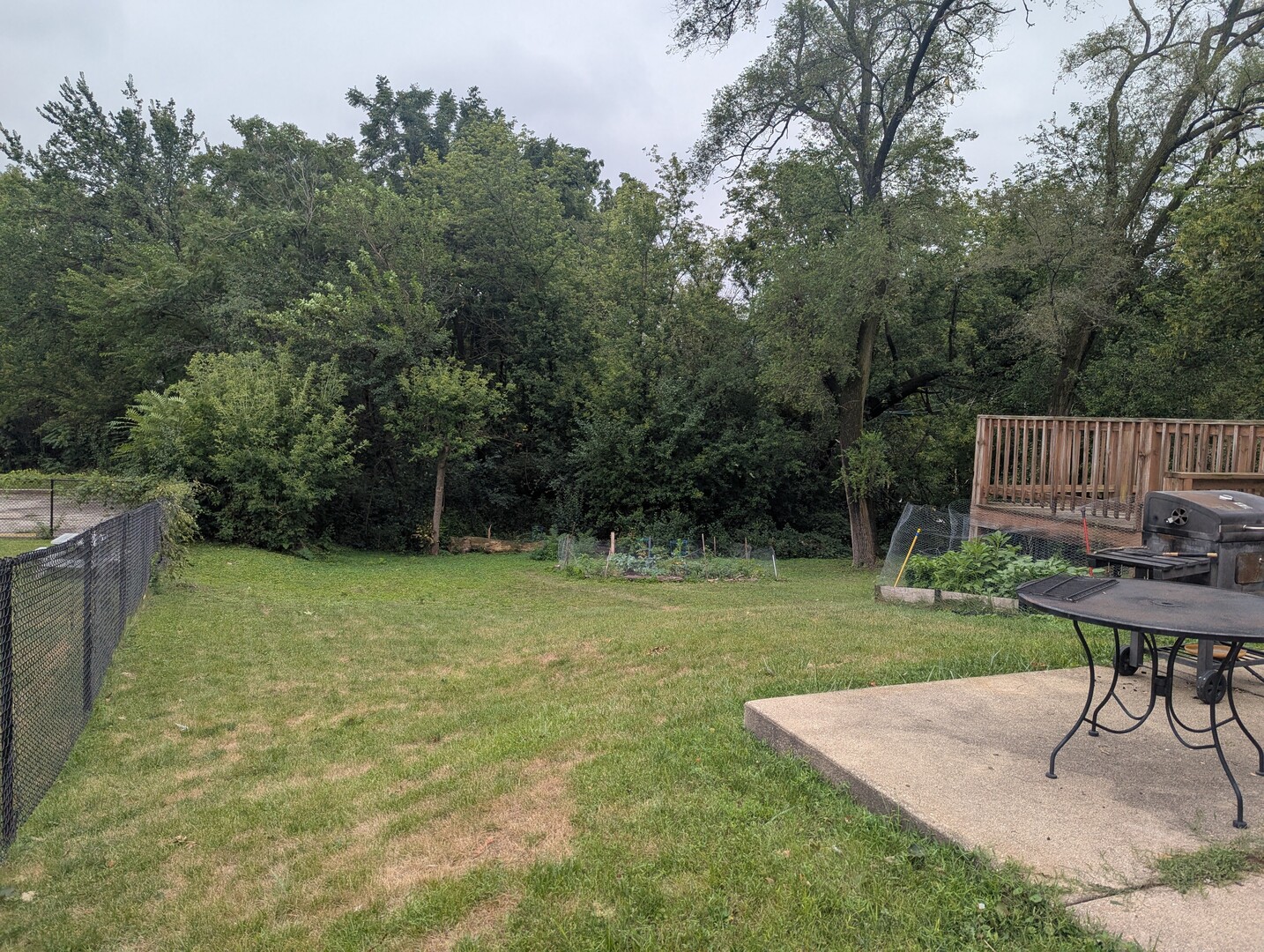 413 West Palatine Road Palatine, IL 60067 - Photo 19 of 19 a view of a backyard with a table and chairs