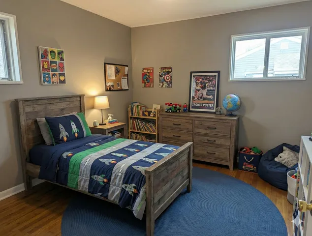 a bedroom with a bed and a closet