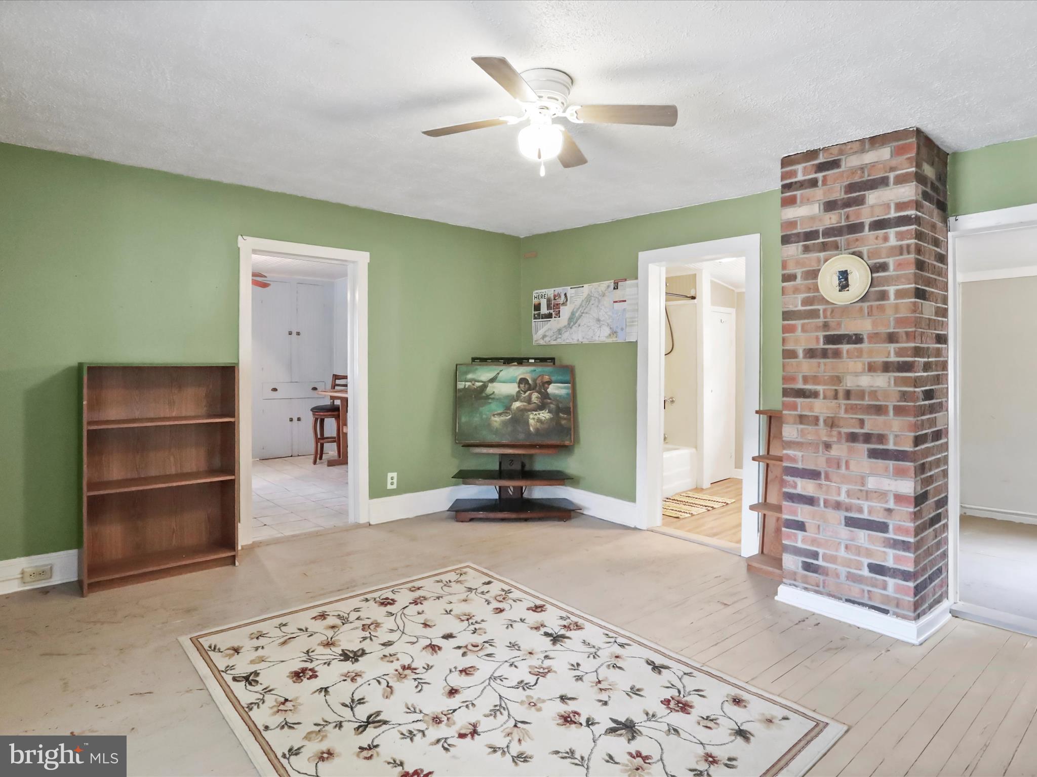 4530 St Davids Church Road Fort Valley, VA 22652 - Photo 5 of 49 a living room with a furniture and a rug