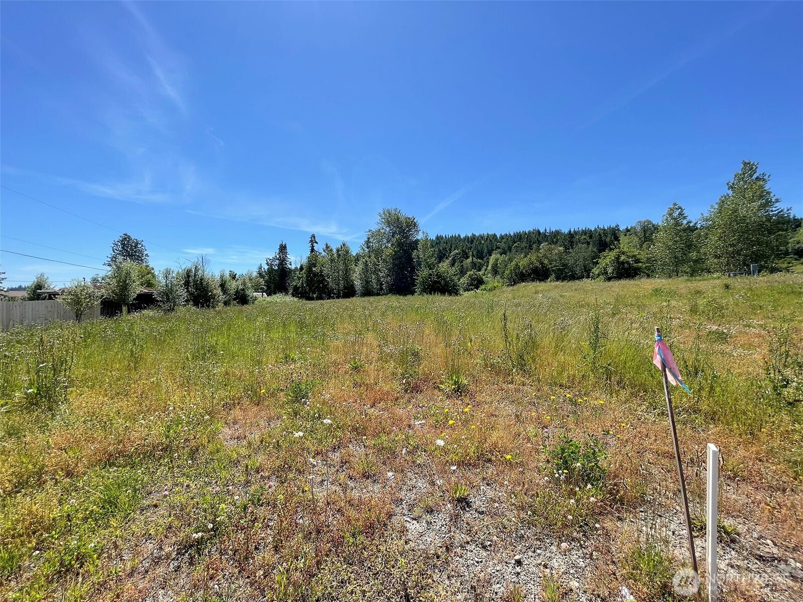 842 South Still Road Sequim, WA 98382 - Photo 6 of 13 a view of a lake with houses in the back