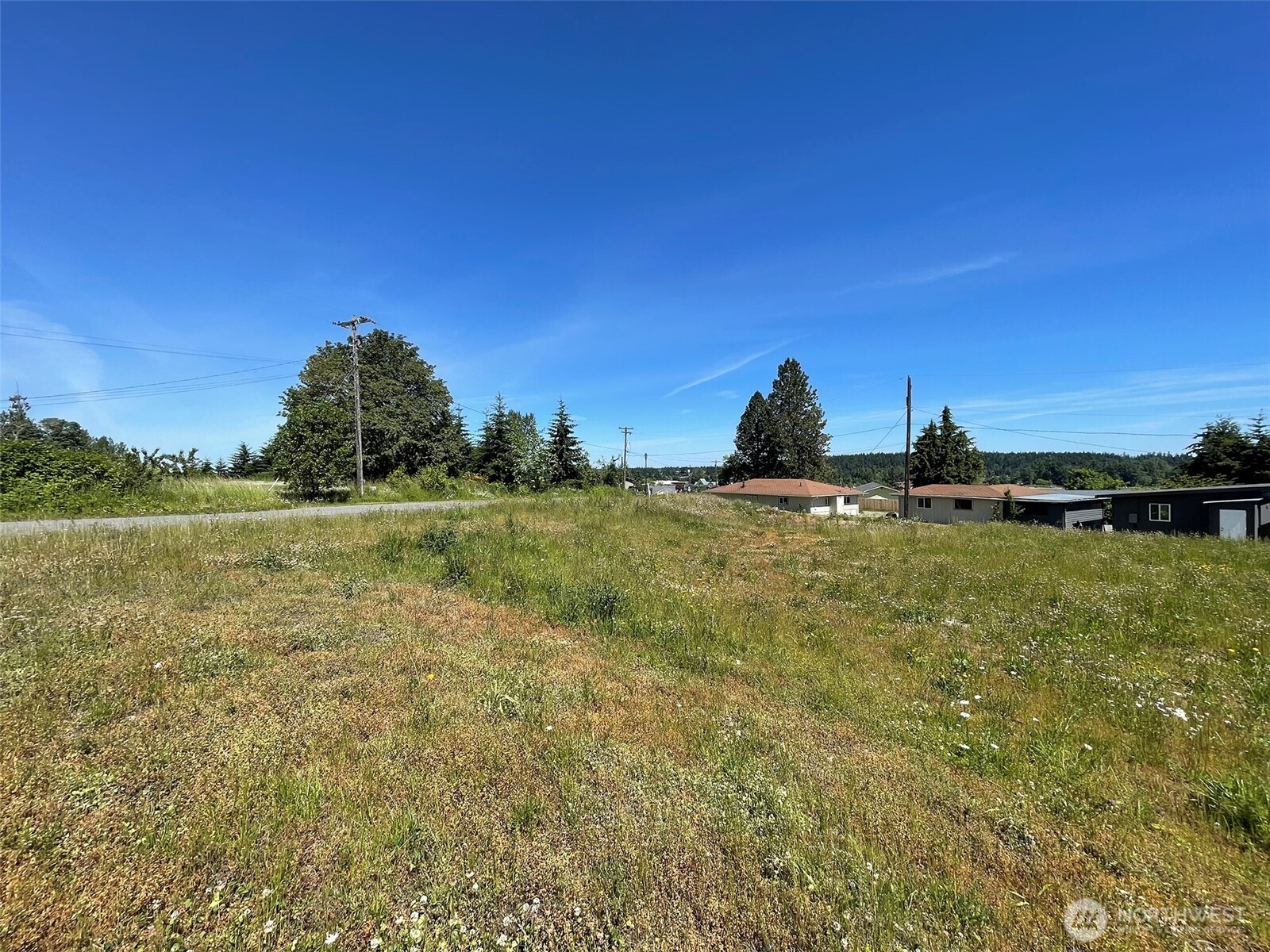 842 South Still Road Sequim, WA 98382 - Photo 9 of 13 a view of a lake with a yard