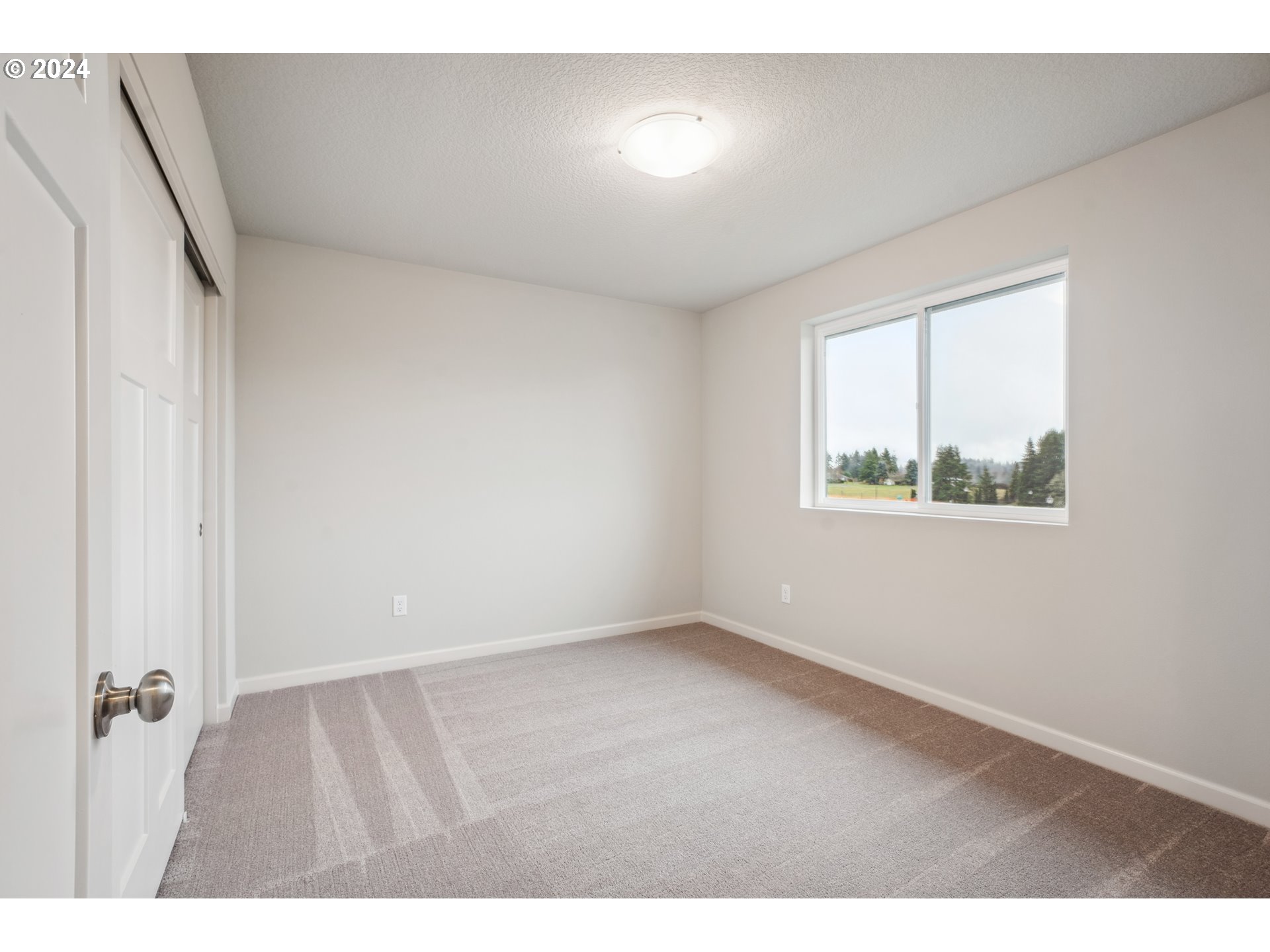 2633 South 7th Circle Ridgefield, WA 98642 - Photo 38 of 39 a view of an empty room with a window