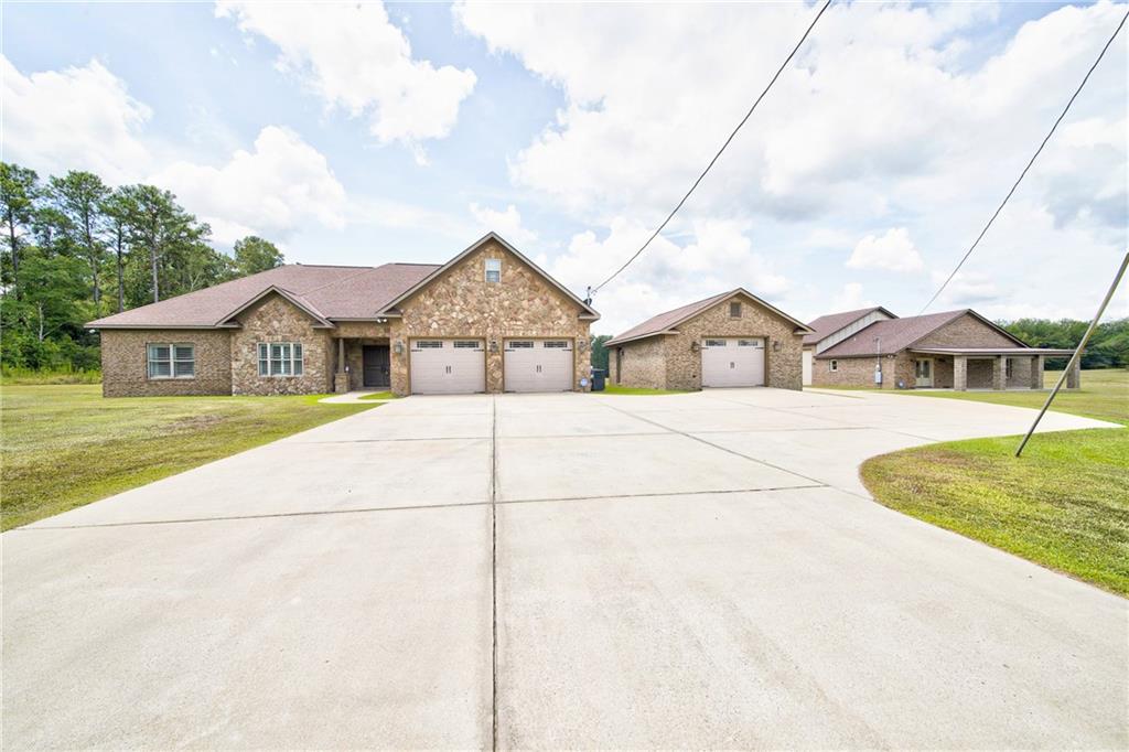 611 Padgetts Road Opelika, AL 36804 - Photo 2 of 64 Expansive concrete driveway