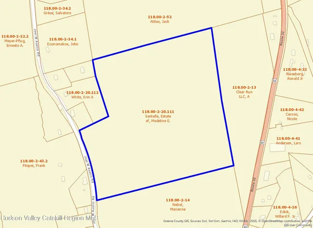 a view of a door with a door and a white car