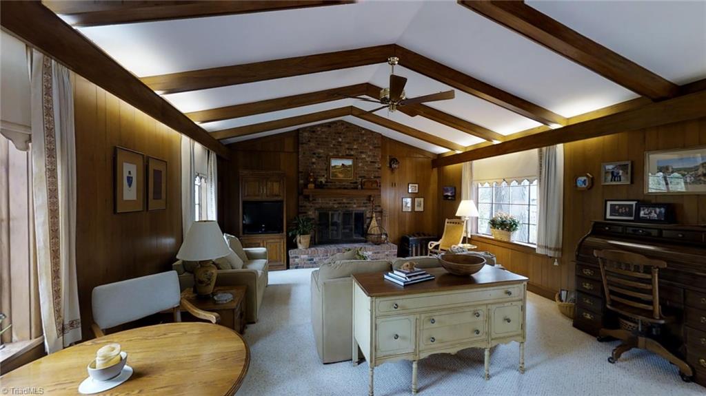 1104 Rockford Road High Point, NC 27262 - Photo 12 of 30 Perfect for Entertaining. A large Vaulted Great Room with fireplace and access to the beautiful landscaped yard with brick patio.