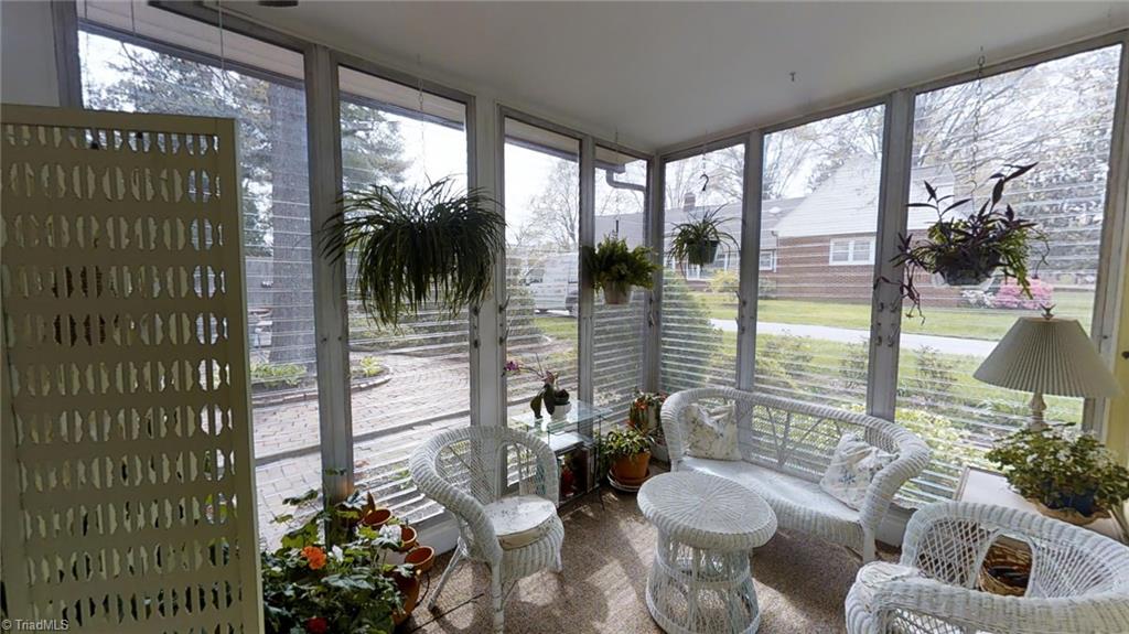 1104 Rockford Road High Point, NC 27262 - Photo 17 of 30 Don't you just love this open and bright Sun room that overlooks the back yard. Sit down with your morning coffee and enjoy the view!